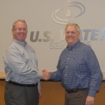 U.S. Water CEO, Allan Bly & ChemCal CEO Steve Dumler shake hands.